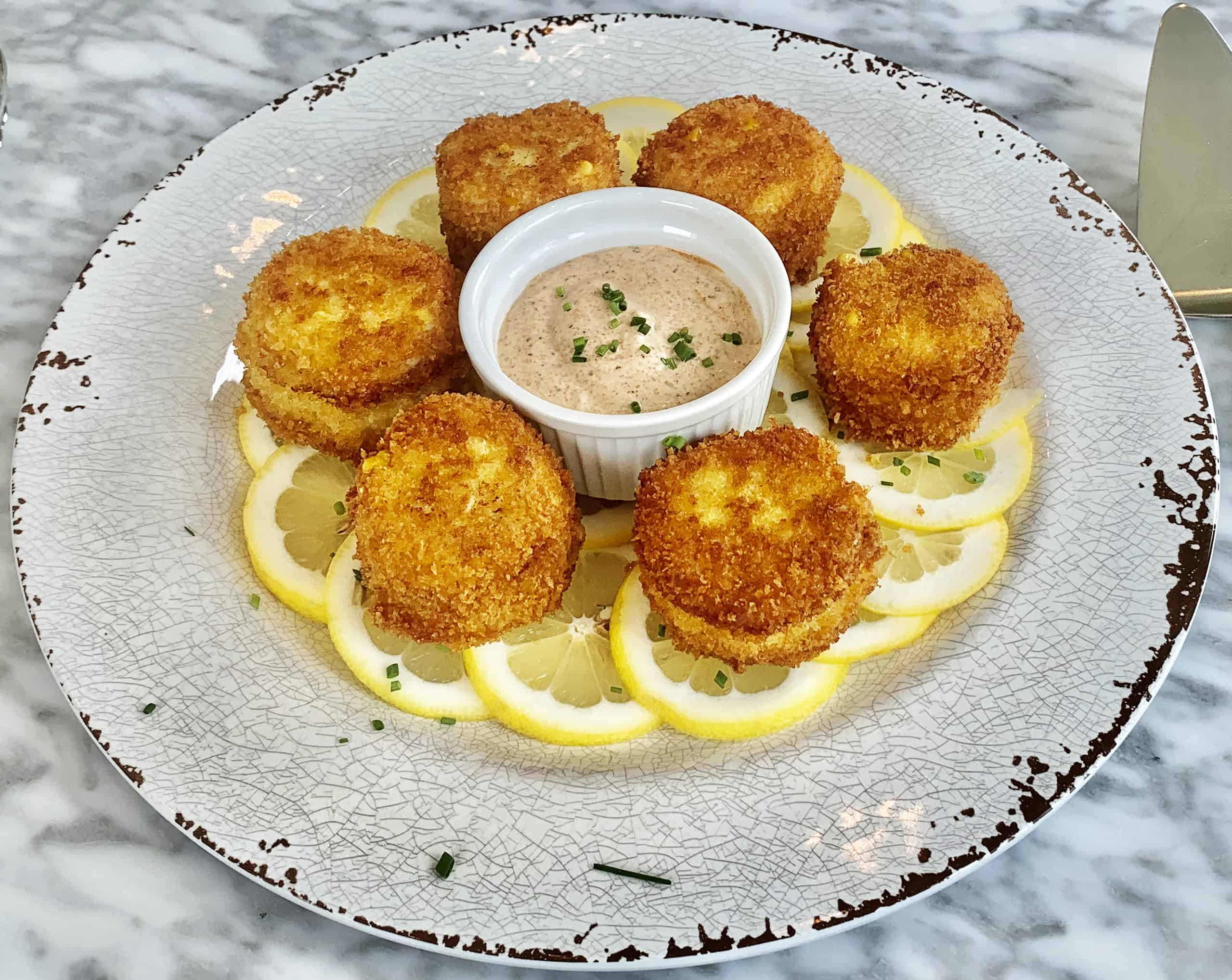 Crab cakes with lemon and dipping sauce